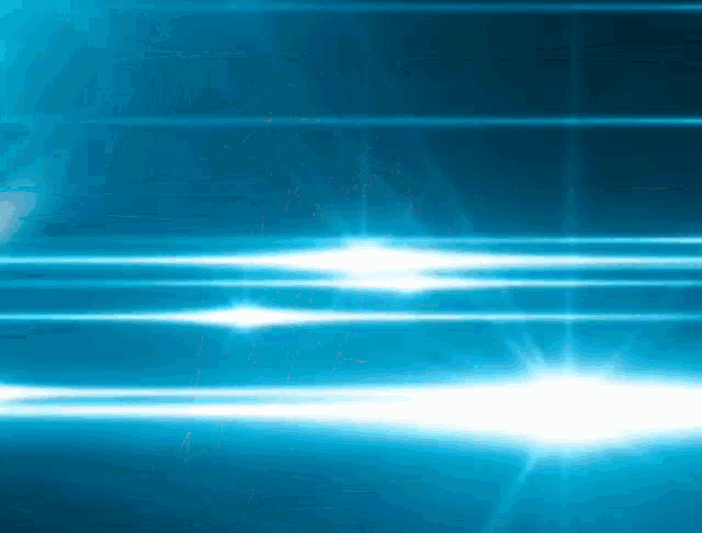 a blue background with a lot of light rays coming out of it