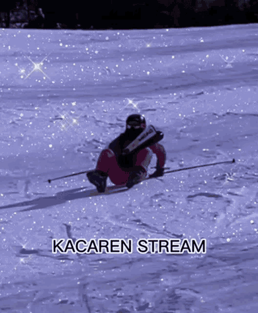 a person is skiing down a snow covered slope with the words kacaren stream written below them