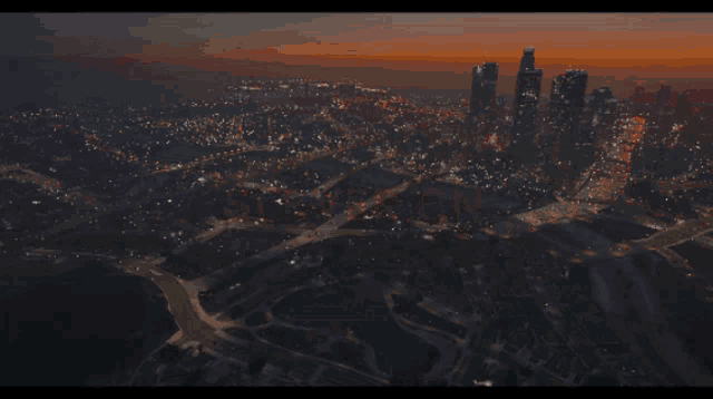 an aerial view of a city at night with the words server on in red