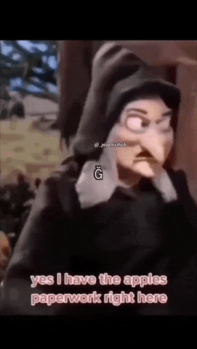 the witch from snow white and the seven dwarfs is wearing a hooded cape .