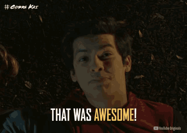 a man laying on the ground with the words that was awesome on the bottom