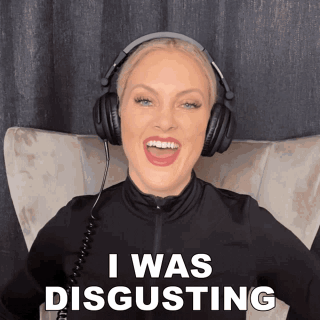 a woman wearing headphones says " i was disgusting " while sitting in a chair