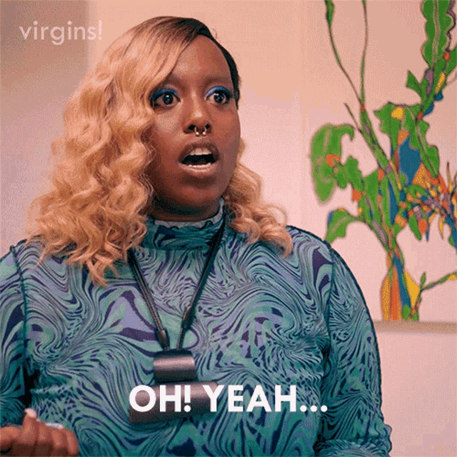 a woman says oh yeah in front of a picture
