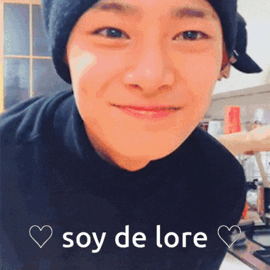 a close up of a person 's face with the words soy de lore