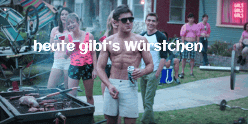 a shirtless man stands in front of a group of people with the words heute gibt 's wurstchen written above him