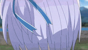 a close up of a person 's hair with a blue ribbon around it