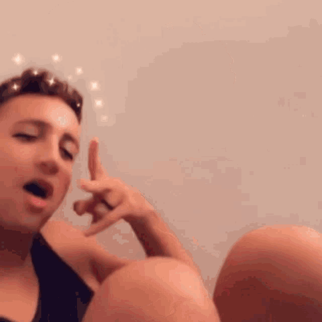 a blurry picture of a person making a funny face