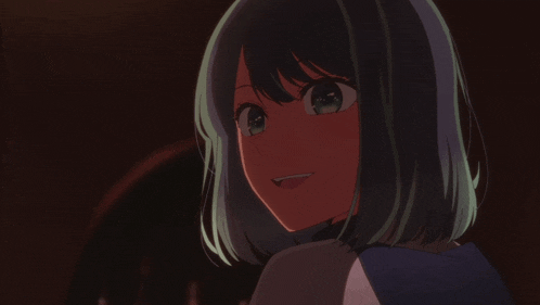 a close up of a girl 's face with green hair