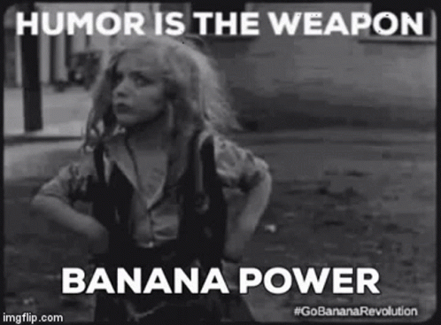 Banana Power Humor Is The Weapon GIF - Banana Power Humor Is The Weapon Hair Flip GIFs