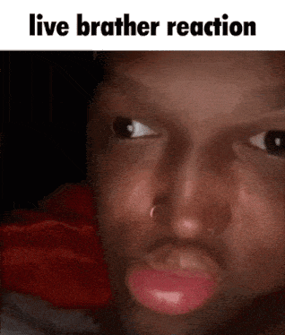 a close up of a man 's face with the words `` live brother reaction '' above him .