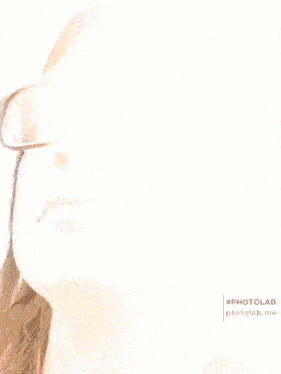 a close up of a woman 's face wearing glasses and red lips