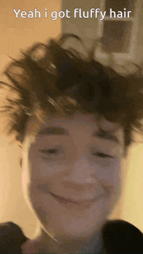 a person with a funny face and the words yeah i got fluffy hair above them