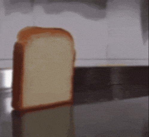 a slice of bread sits on a counter top