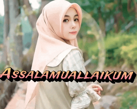a woman wearing a hijab stands in front of a sign that says " assalamualaikum "
