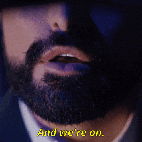 a man with a beard says " and we 're on " in yellow