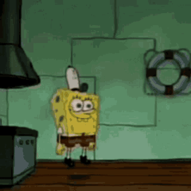 a cartoon of spongebob squarepants standing in a kitchen .