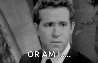 a man in a suit and tie is making a funny face and saying `` or ami ... '' .