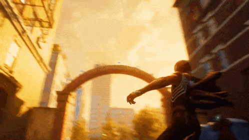 a man in a spiderman costume is running through a city street