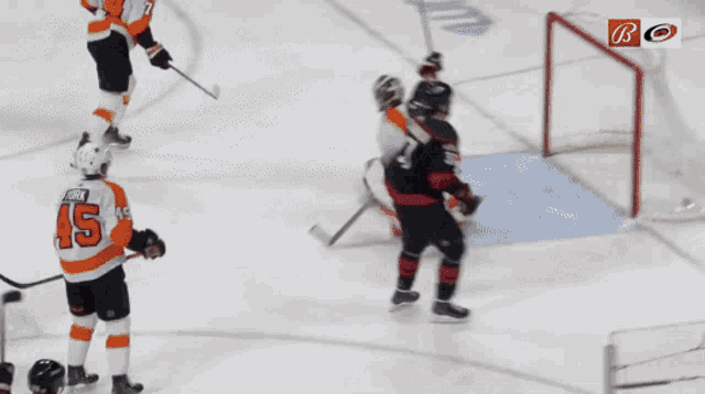 a hockey player with the number 37 on his jersey is skating on the ice