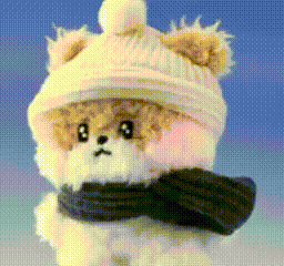 a stuffed animal wearing a hat and scarf with the number 8 on its face
