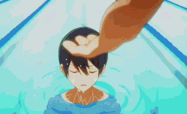 a close up of a man 's torso with water running down it