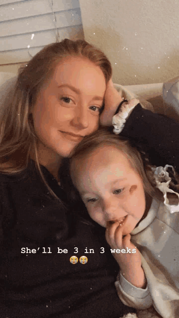 a woman and a little girl are posing for a picture and the caption says she 'll be 3 in 3 weeks