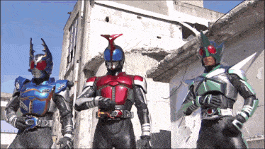 three kamen riders are standing next to each other