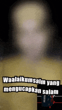a blurred image of a person with the words waalaikumsalam yang mengucapkan salam