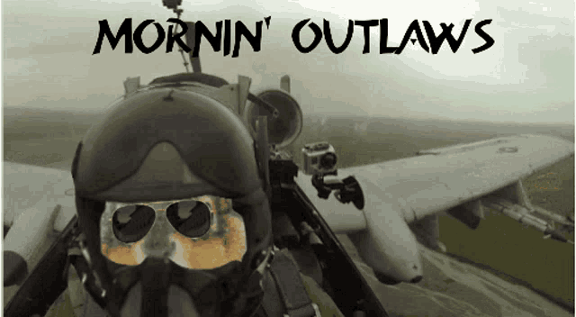 a picture of a fighter jet with the words mornin ' outlaws on the bottom
