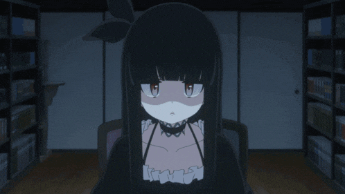 a girl with black hair and blue eyes is sitting in front of a bookshelf