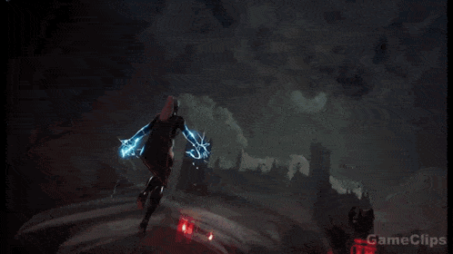 a woman in a storm costume is holding a lightning bolt in her hands .