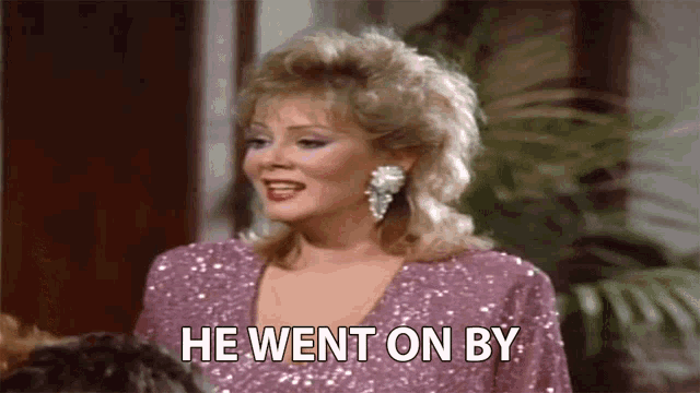 a woman in a purple dress says he went on by .
