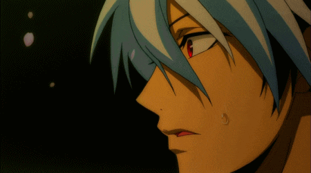 a close up of a person 's face with a tokyo tv logo in the background