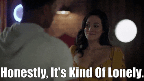 a man and a woman are looking at each other and the woman says honestly it 's kind of lonely