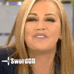 a close up of a woman 's face with the word swordah written on the bottom .