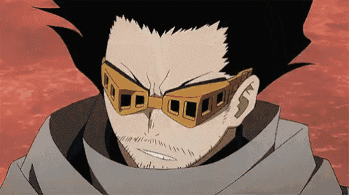 a close up of a man wearing glasses and a scarf .