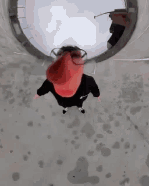 a person wearing glasses is standing in a circle