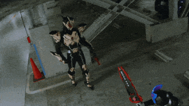 a man holding a chainsaw in a parking lot