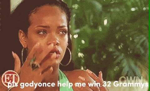 a woman with hoop earrings is crying with the words " bis godyonce help me win 32 grammys " on the bottom