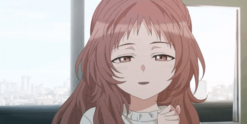 a close up of a girl 's face with long brown hair