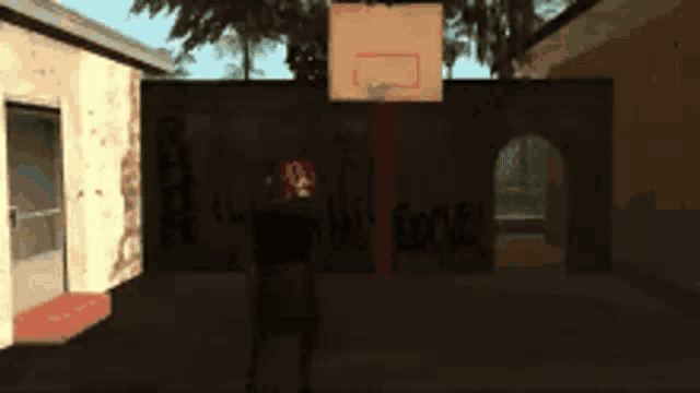 a basketball court with gobi written on a wall