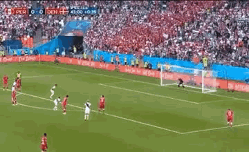 a soccer game is being played in a stadium and the score is 0-0