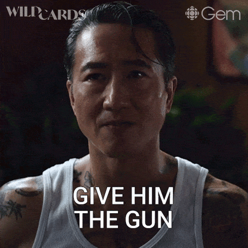 a man in a white tank top is asking for the gun