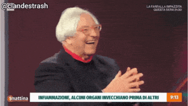 a man in a suit is being interviewed on a tv show called mattina