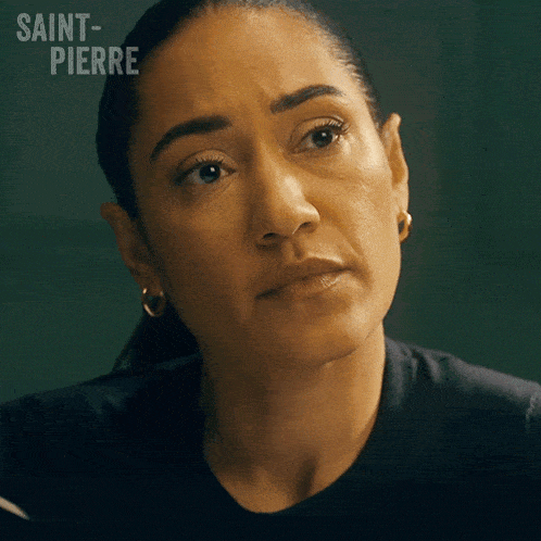 a close up of a woman 's face with the word saint-pierre behind her