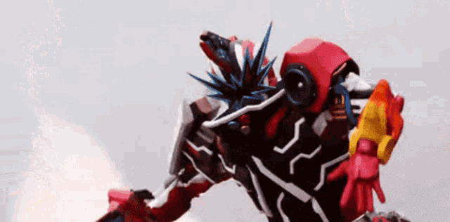 a robot with a sword and a helmet is flying in the air .
