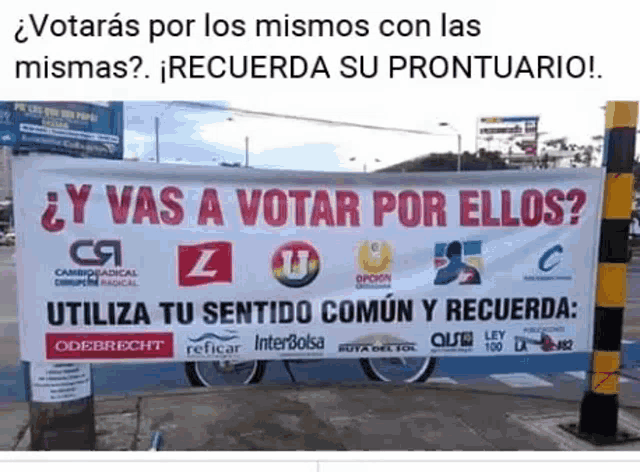 a billboard that says y vas a votar por ellos .