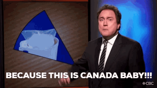 a man in a suit and tie says " because this is canada baby !!! "