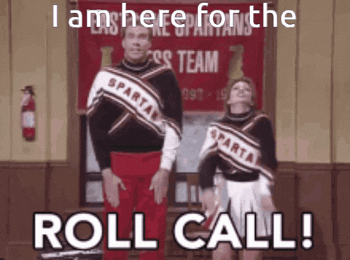 a couple of cheerleaders are standing in front of a sign that says i am here for the roll call