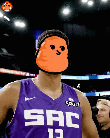 a basketball player wearing a purple jersey with sac on it